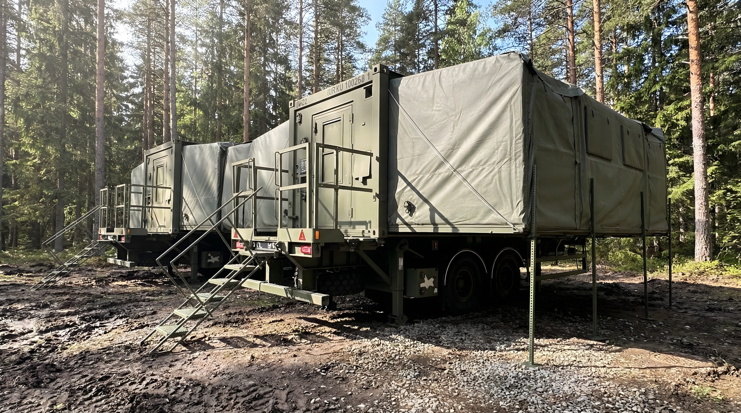 2 MECCs complexed in a forest on military exercise