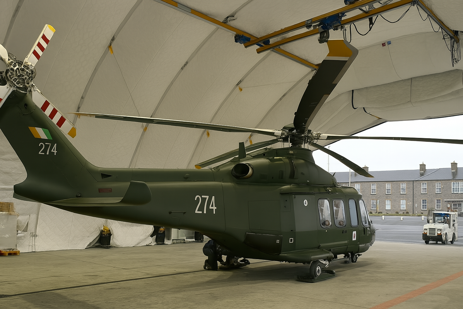 A photograph of a helicopter in a Weatherhaven supplied hangar